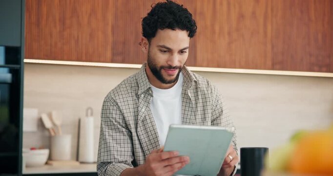 Remote work, man and smile with tablet in kitchen for editing, story approval or draft feedback. Freelancer, happy editor or tech in home for proofreading blog, article review or fact checking source