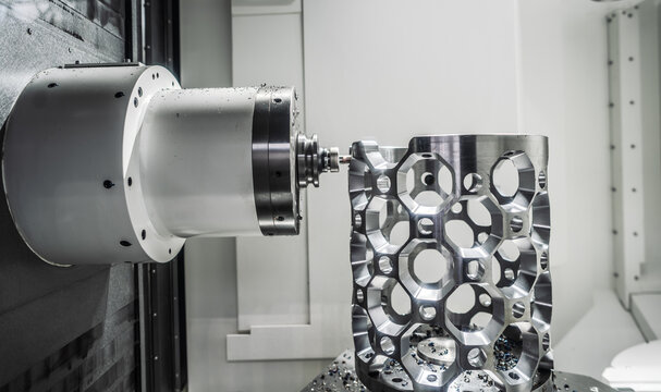 CNC milling machine processing an aluminum aerospace part.