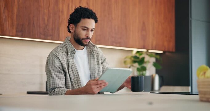 Remote work, coffee and man with tablet in kitchen for story review, draft editing and online news. Hot beverage, freelance editor and tech in home for proofreading, article grammar and reading blog