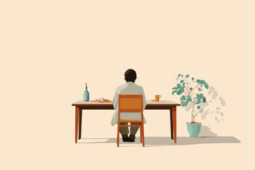 Fototapeta premium Male sitting alone at table in minimalist room with plant and decorations