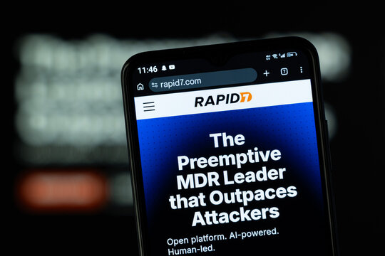 Dhaka, Bangladesh - 05 May 2026: Close-up of Rapid7's homepage on a smartphone.