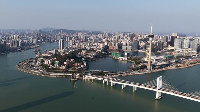 Aerial macau cityscape showing the tower and sai van bridge