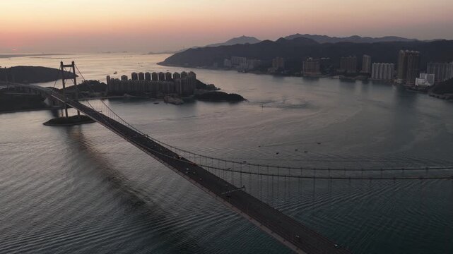 Aerial view of tsing ma bridge connecting islands at sunset