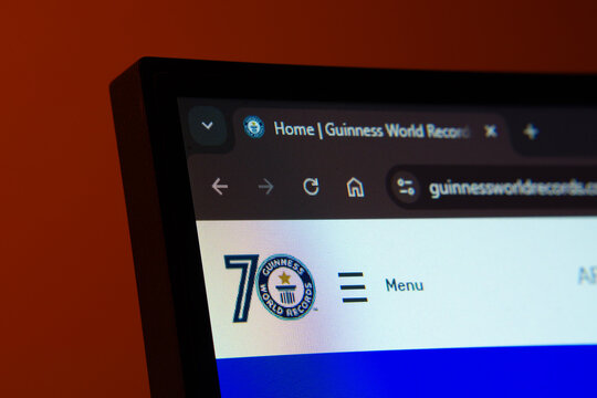 Dhaka, Bangladesh- 02 June 2025: Close-up of a computer screen displaying the Guinness World Records web interface in dark mode