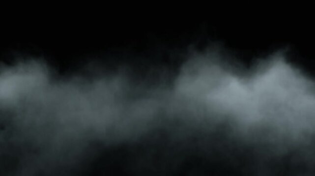 Dense grey smoke billowing against a solid black background. Thick atmospheric fog moving slowly across the dark screen. Cinematic visual effect overlay for dramatic video transitions.