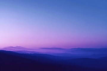 Obraz premium Serene purple and blue mountain landscape at dusk
