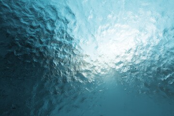 Obraz premium Abstract water texture with sunlight shining through rippling blue surface