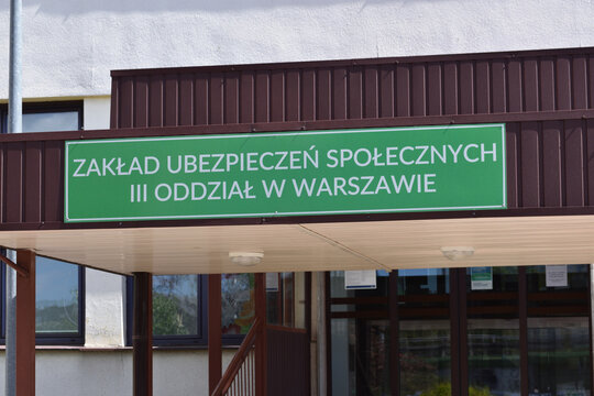 ZUS (Social Insurance Institution, Polish name: Zaklad Ubezpieczen Spolecznych) facade of the buiding with signage, logo, emblem. WARSAW, POLAND - APRIL 28, 2026