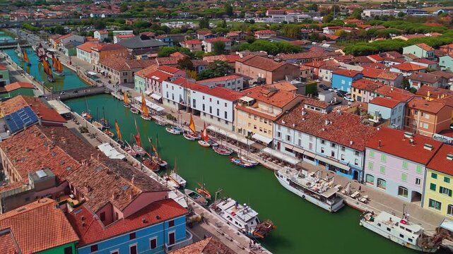 Aerial view of historic sailing boats in Cesenatico port Italy