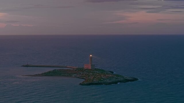 Aerial Night View of Vieste historic lighthouse in Puglia Italy