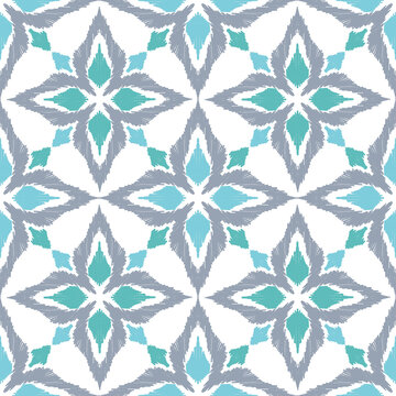 Contemporary seamless geometric pattern with ikat-inspired texture in cool turquoise and slate tones. Created for coastal interiors, boutique textiles, hospitality decor, and modern surface design pro