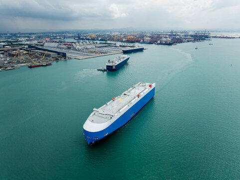 Large Car Carrier Vessels Navigating The Waters Of Laem Chabang Port In Thailand For Global Automotive Logistics And International Trade