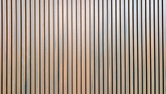 Seamless wooden slat background with vertical planks and subtle grain, offering a calm, modern textured surface ideal for interiors, architecture, product staging