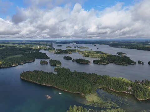 Aerial view of lush islands and blue water in the 1000 Islands region, St. Lawrence River, Canada. g