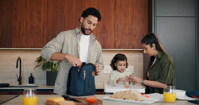 Parents, child and packing lunch in home for morning routine, support and education. Teaching, busy and family or people with toddler and bag for meal, snack or nutrition with mom and dad in kitchen