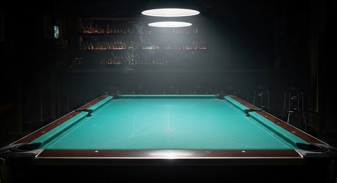 Billiard table illuminated in dimly lit room with overhead lighting