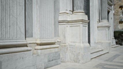Blurred marble facade with classical columns and stepped entrance, defocused church exterior  background backplate copyspace. © Krakenimages.com