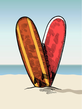 V - shaped surfboards in the sandy beach. Heart sign