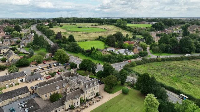 Aerial Drone View of Modern Housing Development and Suburban Streets in Barton Seagrave Village UK