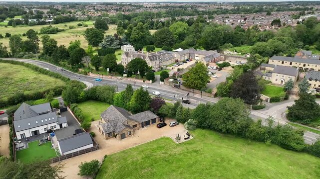 Aerial View of Modern Country House and Rural Road in Barton Seagrave Northamptonshire English Village