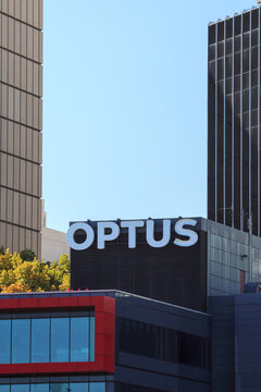 Perth, Western Australia, Australia - May 8 2026: Optus logo and brand name against office building. Second largest telecommunications company, Australia. Mobile phones, nbn, home internet