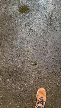 man walking in the rain