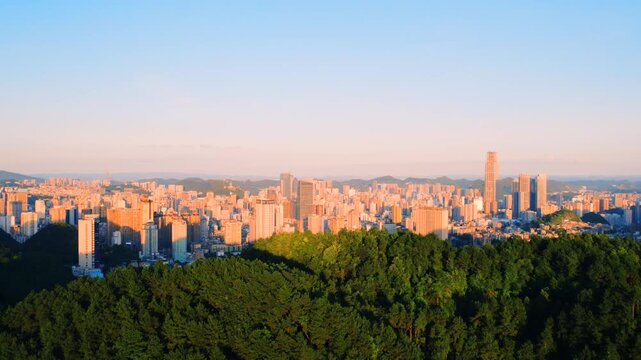 Guiyang Guizhou Skyline and Forest at Sunset in Guiyang, Guizhou, China