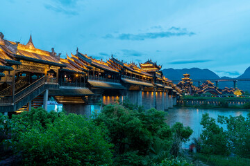 Naklejka premium The ancient covered bridge over the river is known as the No.1 covered bridge in Asia.