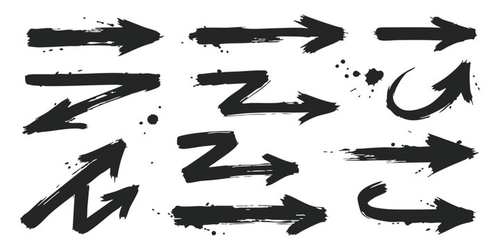 Set of black ink brush stroke arrows and hand drawn pointers for design