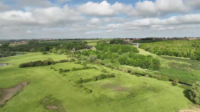 Aerial Drone View of Green Meadows and River Nene Wetlands in Northamptonshire English Countryside
