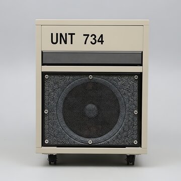 Industrial UNT 734 speaker equipment closeup.