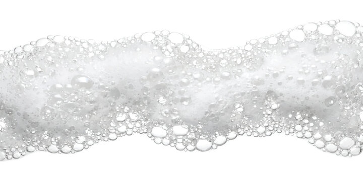 Soft white soap foam bubbles with texture in a long horizontal wave shape for bathroom and cleaning product concepts
