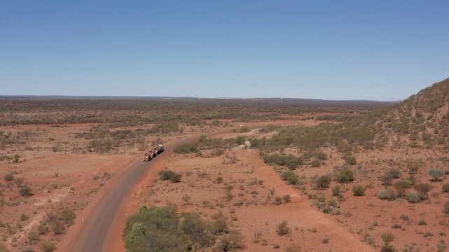 Mining Road Train on the Highway in the Outback, Goldfields, Western Australia, Aerial View