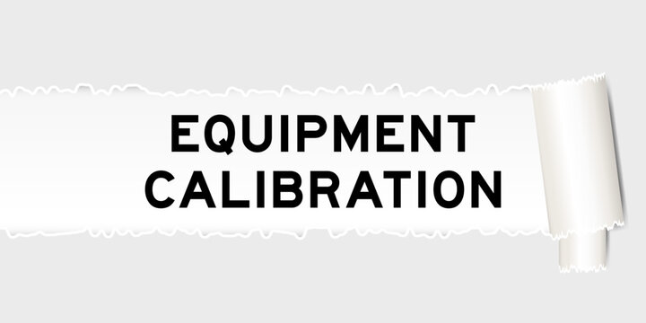 Ripped gray paper background that have word equipment calibration under torn part