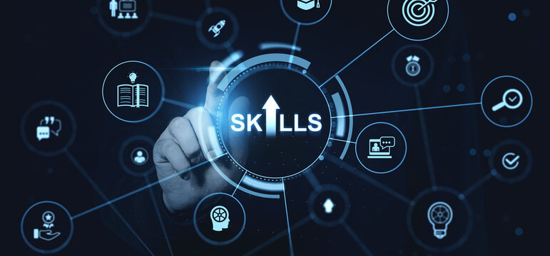 Futuristic digital interface with hand touching skills icon amid glowing business symbols on dark background for modern learning and development theme.