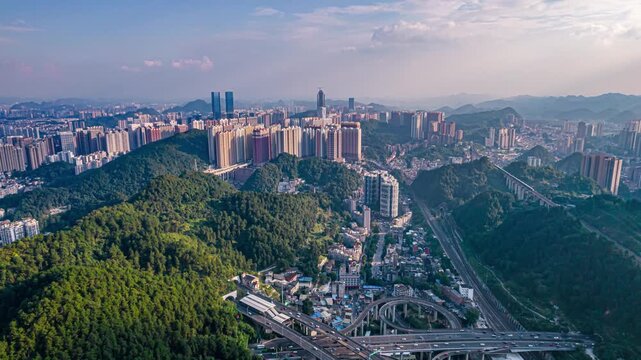Aerial Cityscape of Guiyang Among Green Mountains in Guiyang, Guizhou, China