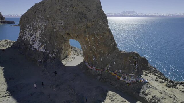 Rocky Natural Arch on Lake Namtso Shore in Tibet in Lake Namtso, Tibet