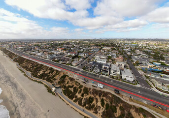 Fototapeta premium Aerial Drone View of Coastal Bluffs and Beachfront Real Estate in Carlsbad California