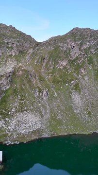 Balea Lake aerial view with emerald water in Carpathian Mountains