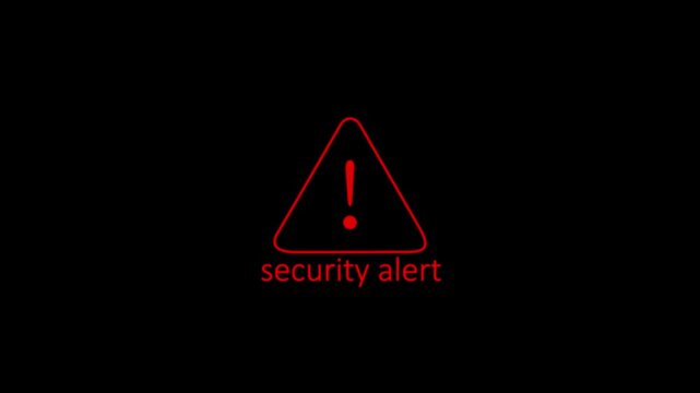 Red security alert warning triangle with exclamation mark
