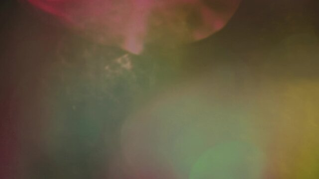 A colorful light transition with vibrant gradient beams and fluid animation.