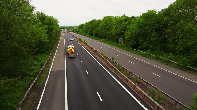 Heavy Haulage Convoy Moving Oversize Load on Highway