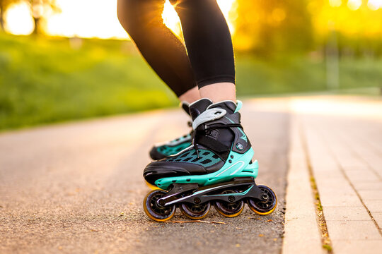 Girl Rollerblading At Sunset