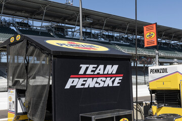 Obraz premium Team Penske stall on Pit Road at Indianapolis Motor Speedway. Team Penske has many Indianapolis 500 victories.