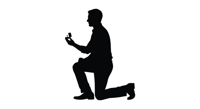 man proposing with ring box kneeling silhouette