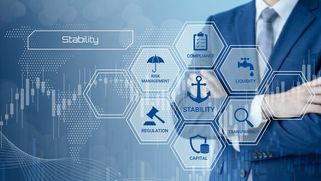 Business professional analyzing financial stability concepts with interconnected risk management and compliance elements