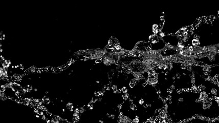 Obraz premium Dynamic Water Splash with High Contrast Against Black Background