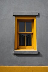 Obraz premium Portrait of yellow window on gray wall background 