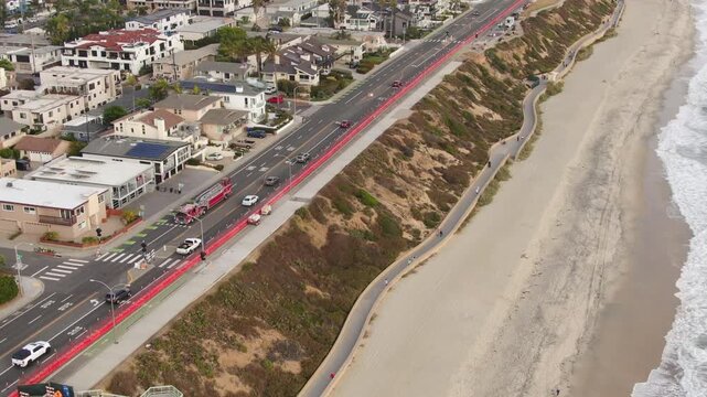 Carlsbad CA Fire Department Tiller Fire Truck Responding Northbound on Coast Highway