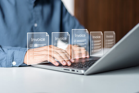 Businessman reviewing digital invoice documents and billing records. Representing electronic invoicing systems, cloud accounting software, financial audit compliance, and corporate tax preparation